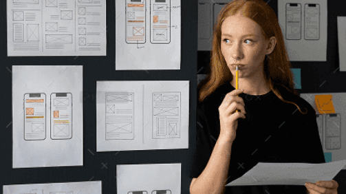 demo-attachment-538-female-web-designer-taking-notes-office